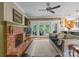 Relaxing living room with brick fireplace and view to the Kitchen at 174 Buffalo Creek Dr, Statesville, NC 28677