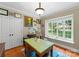Bright office with a large window, hardwood floors, and classic trim at 174 Buffalo Creek Dr, Statesville, NC 28677