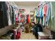 Spacious walk-in closet with organized shelving and ample storage space at 174 Buffalo Creek Dr, Statesville, NC 28677