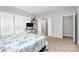 Spacious bedroom featuring an attached bathroom with a glass door shower at 18020 Owl Ct, Indian Land, SC 29707
