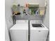 Laundry room with both a washer and dryer and shelving above at 18020 Owl Ct, Indian Land, SC 29707