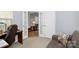 Bright office area with seating that looks into another room at 18020 Owl Ct, Indian Land, SC 29707