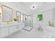 Luxurious bathroom featuring double vanities, sleek shower, and a modern soaking tub at 200 Kimrod Ln, Charlotte, NC 28270