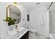 Sleek bathroom featuring modern fixtures, a marble countertop, and stylish decor at 200 Kimrod Ln, Charlotte, NC 28270