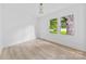 Bright bedroom with ample natural light and wood-look flooring, creating a serene space at 200 Kimrod Ln, Charlotte, NC 28270