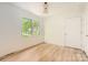 A bright bedroom with natural lighting and wood floors provides a warm and inviting feel at 200 Kimrod Ln, Charlotte, NC 28270