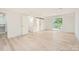 Spacious bedroom with hardwood floors, a closet, and a sliding door to a balcony at 200 Kimrod Ln, Charlotte, NC 28270