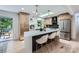 Modern kitchen with stainless steel appliances, a large island with seating, and stylish pendant lighting at 200 Kimrod Ln, Charlotte, NC 28270