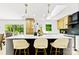 Modern kitchen with a large island, pendant lighting, stainless steel appliances, and sleek finishes at 200 Kimrod Ln, Charlotte, NC 28270