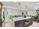 Beautiful kitchen island with built-in microwave and open view to the dining and living room areas at 200 Kimrod Ln, Charlotte, NC 28270