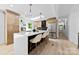 Open kitchen with a large island, bar stool seating, stainless steel appliances, and a bright atmosphere at 200 Kimrod Ln, Charlotte, NC 28270