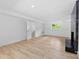 Spacious room featuring a modern fireplace and walk-out to the exterior at 200 Kimrod Ln, Charlotte, NC 28270