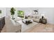 Bright living room with large windows, neutral decor, light wood floors, and stylish seating at 200 Kimrod Ln, Charlotte, NC 28270
