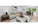 Open-concept living area with views into the dining room, featuring stylish furniture and modern decor at 200 Kimrod Ln, Charlotte, NC 28270