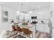 Kitchen island featuring granite countertop, pendant lighting, and seating for three at 2123 Gemway Dr, Charlotte, NC 28216