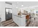 Bright kitchen featuring stainless steel appliances, granite countertops, a center island, and an open floor plan at 2123 Gemway Dr, Charlotte, NC 28216