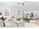 Open-concept living area with dining space, plush seating, and ample natural light at 2123 Gemway Dr, Charlotte, NC 28216