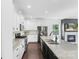 Modern kitchen featuring stainless steel appliances, granite countertops, and a kitchen island at 2214 Laurens Dr, Concord, NC 28027