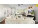 Spacious living room with comfortable sectional sofa, ceiling fan, and a view of the backyard at 2214 Laurens Dr, Concord, NC 28027