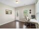 Bright office space with a door to the outside, a work desk, and natural light at 2214 Laurens Dr, Concord, NC 28027