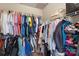 Spacious walk-in closet with ample hanging space and shelving, perfect for organized storage at 2214 Laurens Dr, Concord, NC 28027