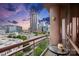 Balcony with city views, outdoor seating and a glass railing at 315 Arlington Ave # 1104, Charlotte, NC 28203