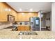 Modern kitchen featuring stainless steel appliances and granite countertops at 315 Arlington Ave # 1104, Charlotte, NC 28203