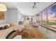 Open-concept living space with cozy seating, city views, and sleek flooring; great for entertaining at 315 Arlington Ave # 1104, Charlotte, NC 28203