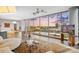 Bright living area featuring panoramic windows offering city views, stylish furniture, and modern decor at 315 Arlington Ave # 1104, Charlotte, NC 28203