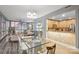 Open living space with a dining area, modern kitchen and expansive views at 315 Arlington Ave # 1104, Charlotte, NC 28203