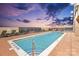Rooftop pool with lounge chairs and city views at 315 Arlington Ave # 1104, Charlotte, NC 28203