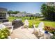Spacious backyard with a patio, seating area, grill, and views of neighboring homes at 3619 Whitney Way, Terrell, NC 28682