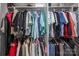 Organized walk-in closet filled with clothing, providing ample storage space at 3619 Whitney Way, Terrell, NC 28682