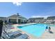 Relaxing community pool with lounge chairs on a sunny day at 3619 Whitney Way, Terrell, NC 28682