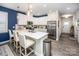 Modern kitchen with stainless steel appliances, granite countertops, and a large island with bar seating at 3619 Whitney Way, Terrell, NC 28682