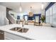 Open concept kitchen with modern appliances, and a seamless transition to the elegant dining area at 3619 Whitney Way, Terrell, NC 28682
