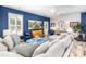 Comfortable living room with stylish furniture, large windows, and a modern ceiling fan to enjoy the space at 3619 Whitney Way, Terrell, NC 28682