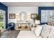 Bright and inviting living room features chic decor, accent lighting, and a view to the backyard at 3619 Whitney Way, Terrell, NC 28682