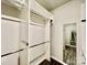 Spacious walk-in closet with hanging rods, shelving, drawers, and a full-length mirror at 3619 Whitney Way, Terrell, NC 28682