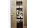 Organized closet with shelving containing folded linens, blankets, and pillows at 400 Antlers Ct, Gastonia, NC 28052