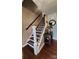 Elegant staircase with patterned stair runners, decorative iron spindles and wood handrail at 400 Antlers Ct, Gastonia, NC 28052