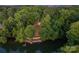Aerial view of waterfront property with lush greenery and private dock at 4749 16Th Street Ne Dr, Hickory, NC 28601