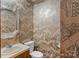 Bathroom featuring patterned wallpaper, a uniquely designed sink, and a toilet at 4749 16Th Street Ne Dr, Hickory, NC 28601