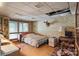 Comfortable bedroom with large window, neutral tones, and ample storage space at 4749 16Th Street Ne Dr, Hickory, NC 28601