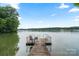 Inviting waterfront property with a private wooden dock, perfect for relaxing and enjoying peaceful lake views at 4749 16Th Street Ne Dr, Hickory, NC 28601