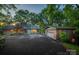 Charming home featuring a stone chimney, inviting front yard and detached garage at 4749 16Th Street Ne Dr, Hickory, NC 28601