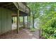 Exterior view of a deck, underneath an upper deck, overlooking a scenic lake at 4749 16Th Street Ne Dr, Hickory, NC 28601