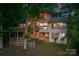 Back exterior of home with multiple decks perfect for outdoor entertainment and relaxation at 4749 16Th Street Ne Dr, Hickory, NC 28601