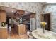 Charming kitchen with wood cabinets, a center island, and a cozy breakfast area at 4749 16Th Street Ne Dr, Hickory, NC 28601