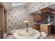 Cozy kitchen with warm tones, skylight and quaint dining nook with tiled floor at 4749 16Th Street Ne Dr, Hickory, NC 28601
